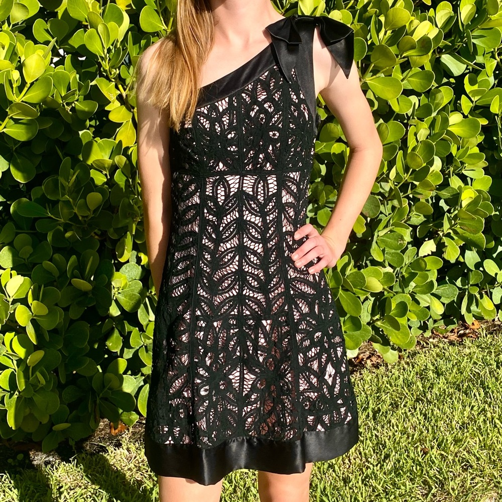 Betsey Johnson elegant black dress size 2.Excellent condition, side zipper.